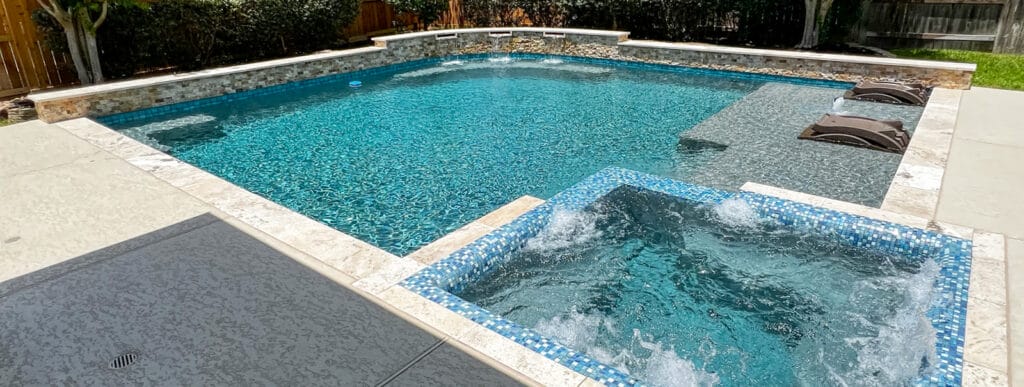 Houston geometric pool with square interior spa.
