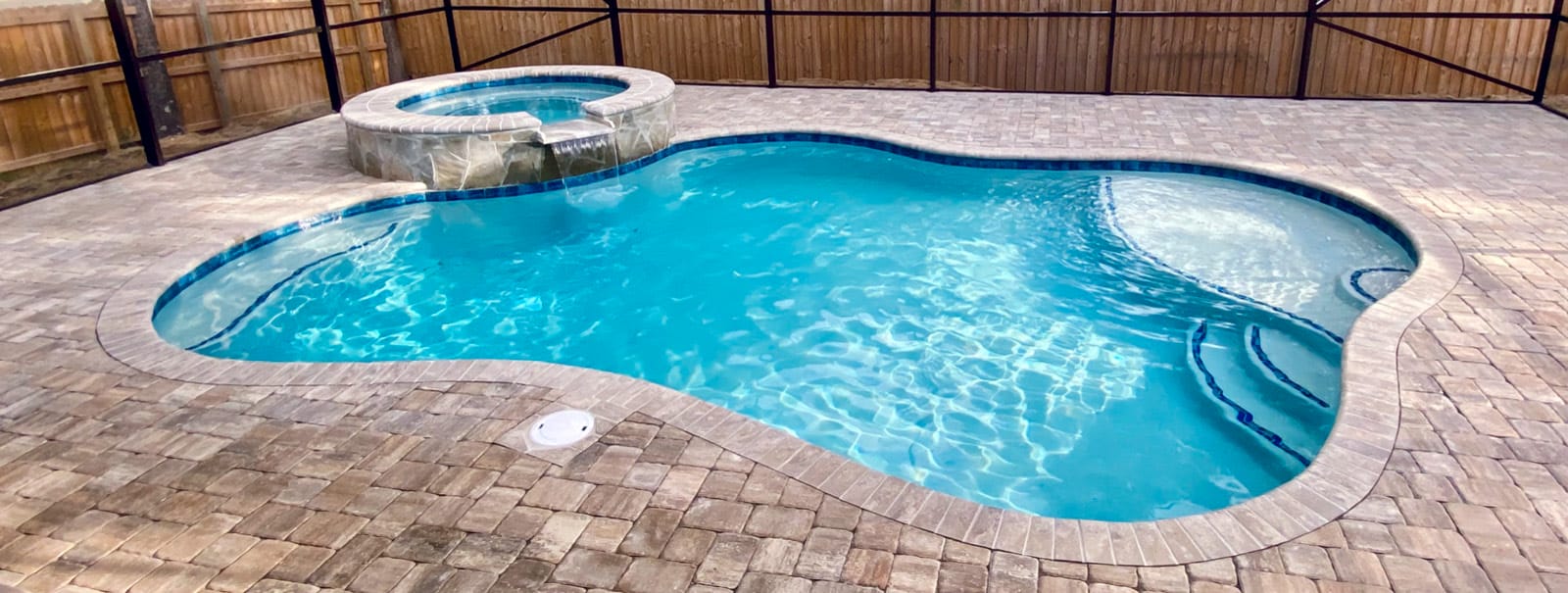 Gunite pool with curvy shape in Fort  Myers.