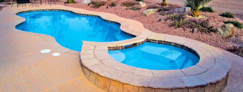 Curvy pool with raised spa in Henderson.