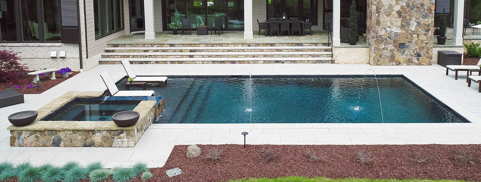 Rectangle pool with square spa in Raleigh