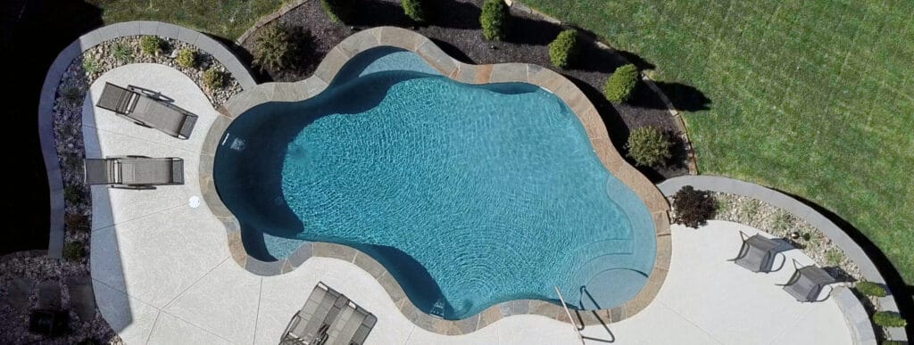 Overhead view of curvy inground pool in St. Louis.