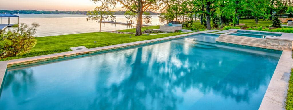 Rectangular gunite pool & spa in Bullard backyard.