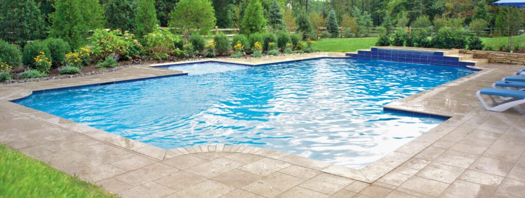 Geometric-shape gunite pool in Lancaster backyard.
