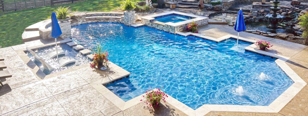 Geometric shape pool with tanning ledge in Kentucky.