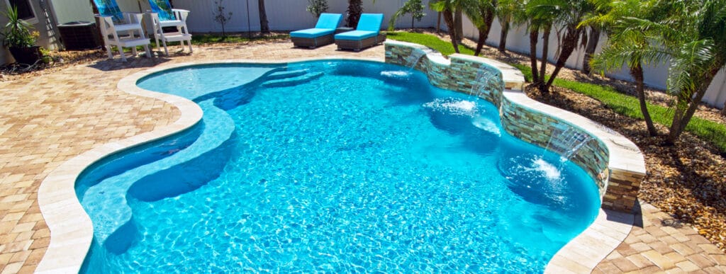 Northeast Florida inground pool with double cascade waterfall.