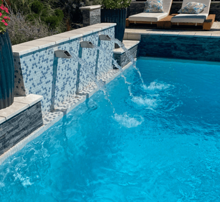 custom water feature on swimming pool