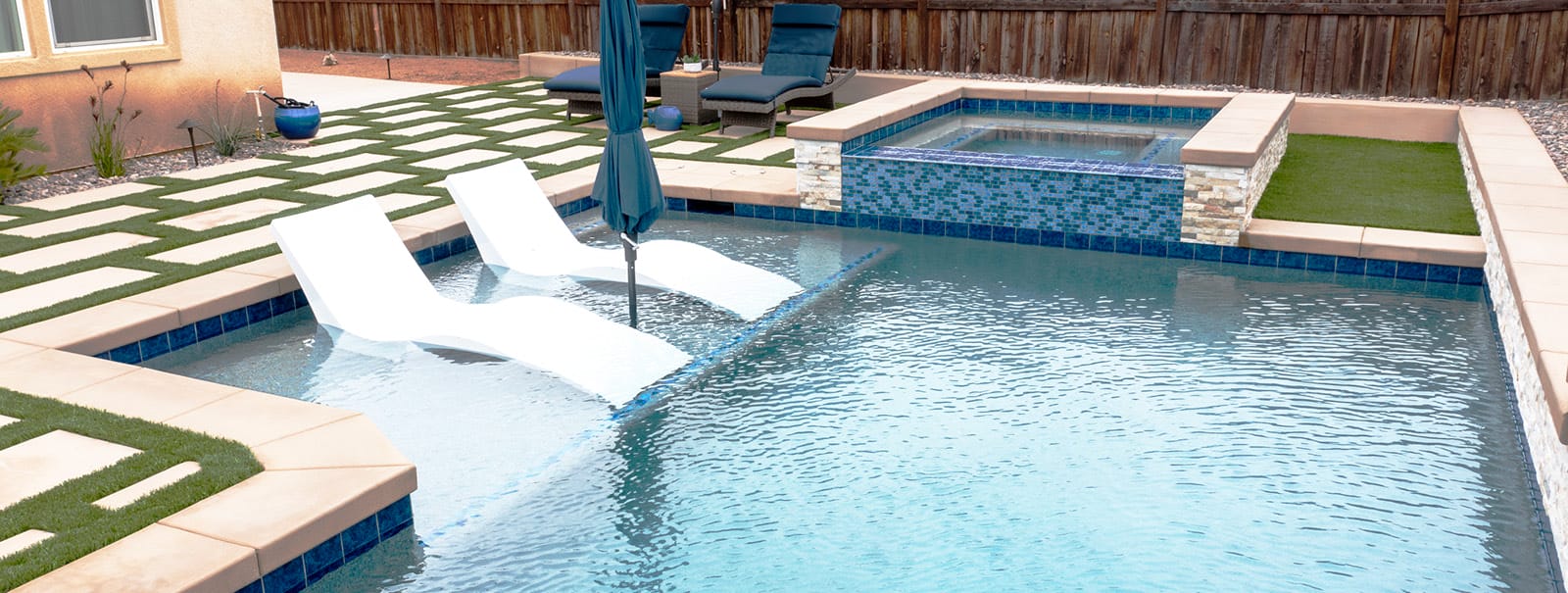 Tanning ledge on inground pool in Carmel Mountain.