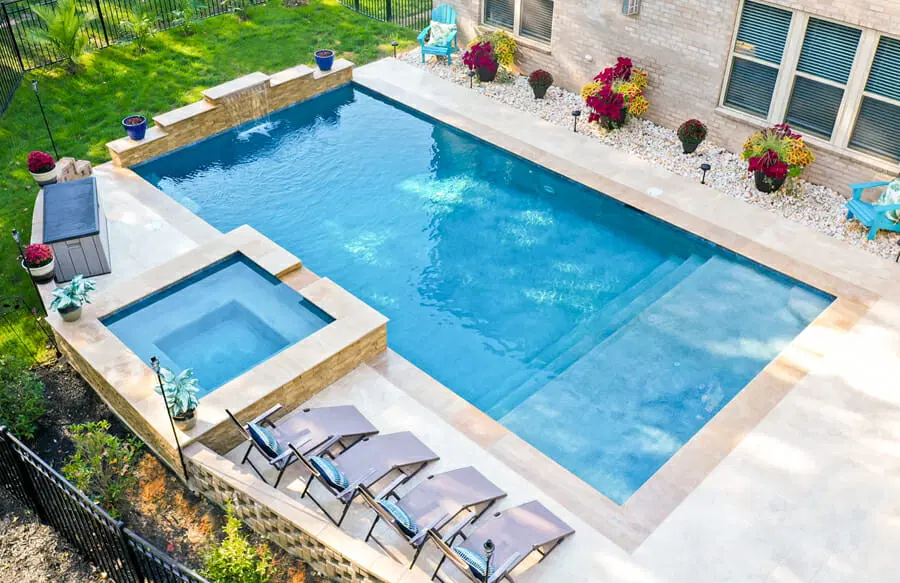 Rectangle-shaped pool with square spa in Charlotte.