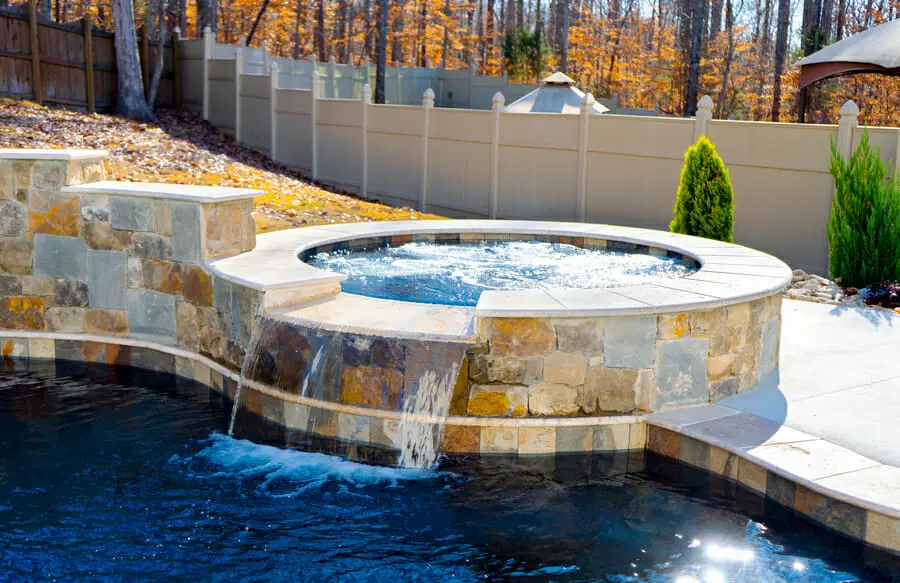 Elevated custom spa on gunite pool in Spartanburg.