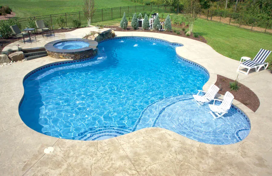 Large, cloud-shaped swimming pool.