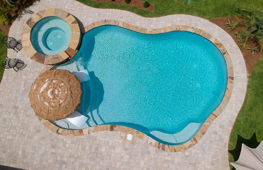 Curvy inground pool & spa in Northwest Florida.