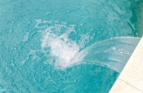 Cascade waterfall on gunite pool.