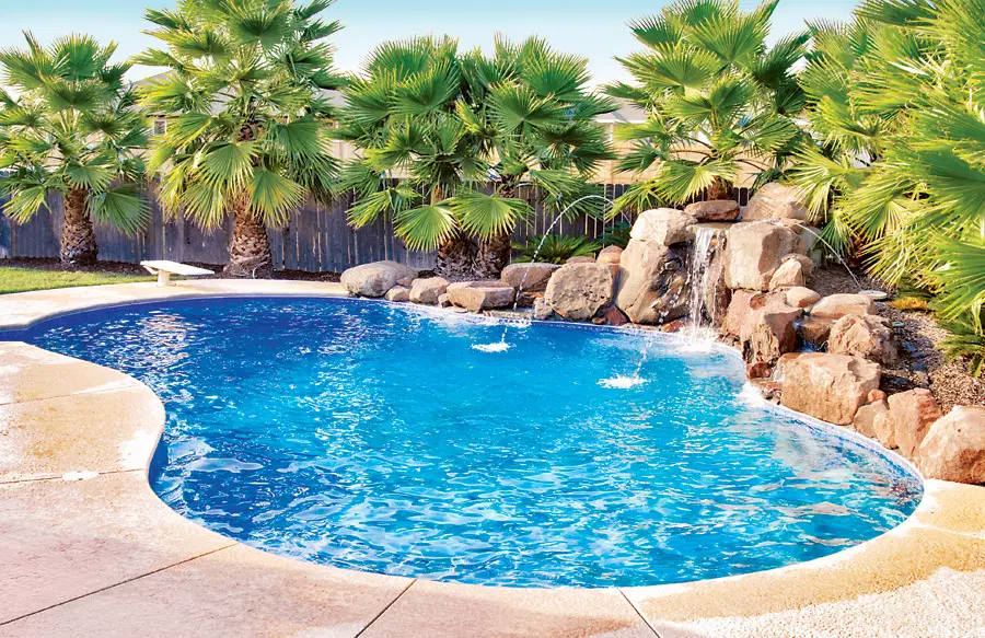Rock waterfall on gunite pool in a Chico backyard.
