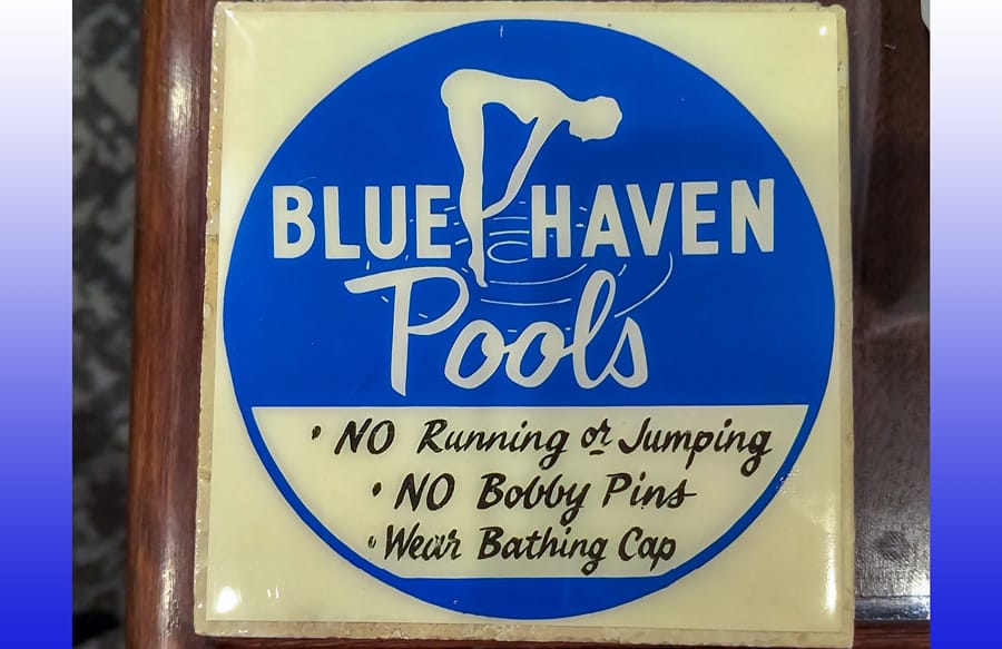 Square ceramic tile with retro 1960s Blue Haven Pools diving lady logo.