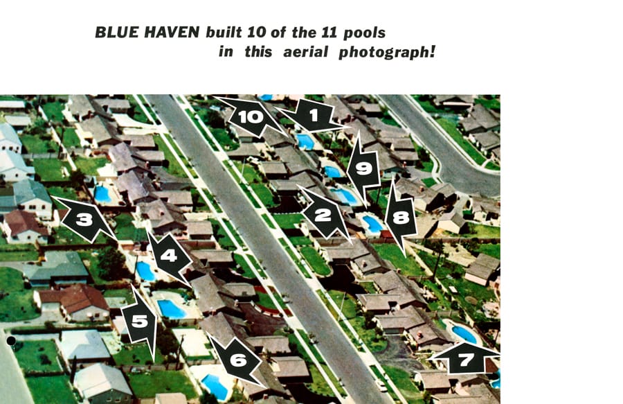 Aerial view of neighborhood with multiple homes wiith Blue Haven swimming pools.