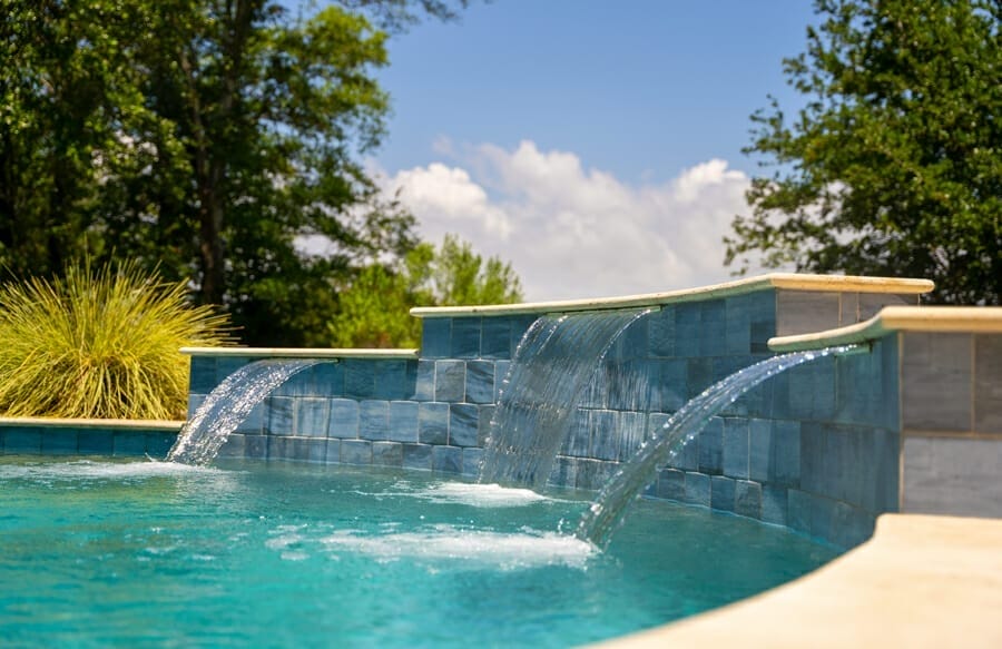 Trio of cascade waterfalls on gunite pool.