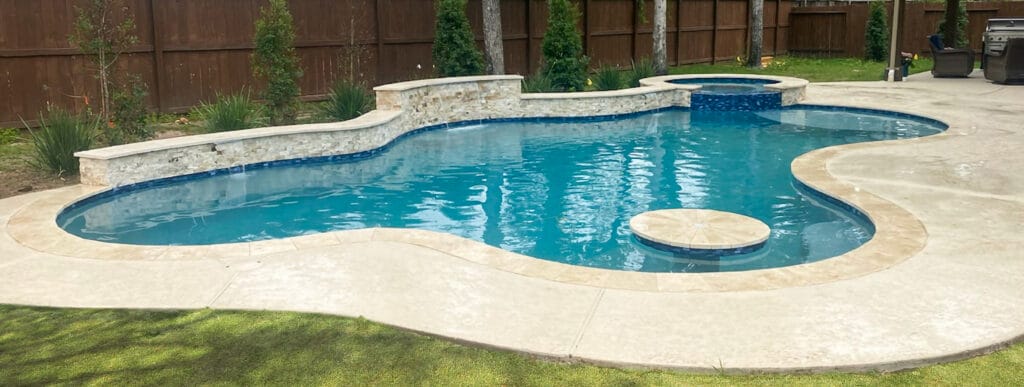 Curvy Bryan swimming pool with swim-up cocktail table.