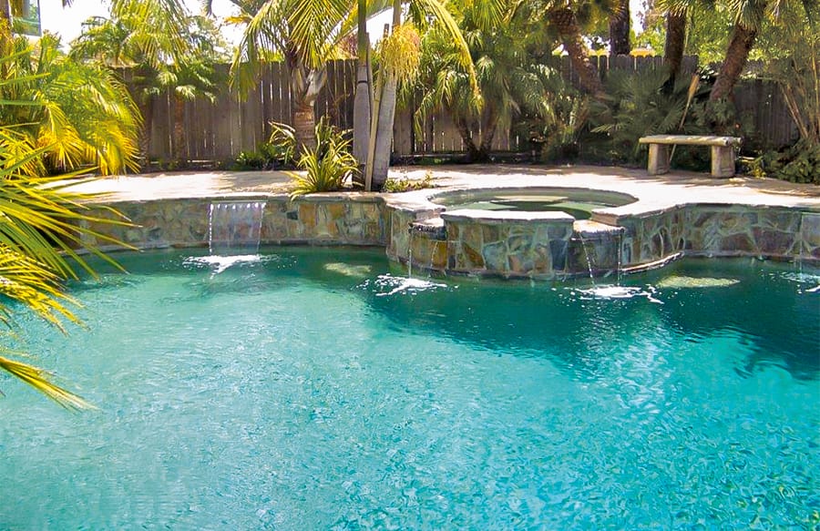 Raised spa and cascade water features on swimming pool in Van Nuys.