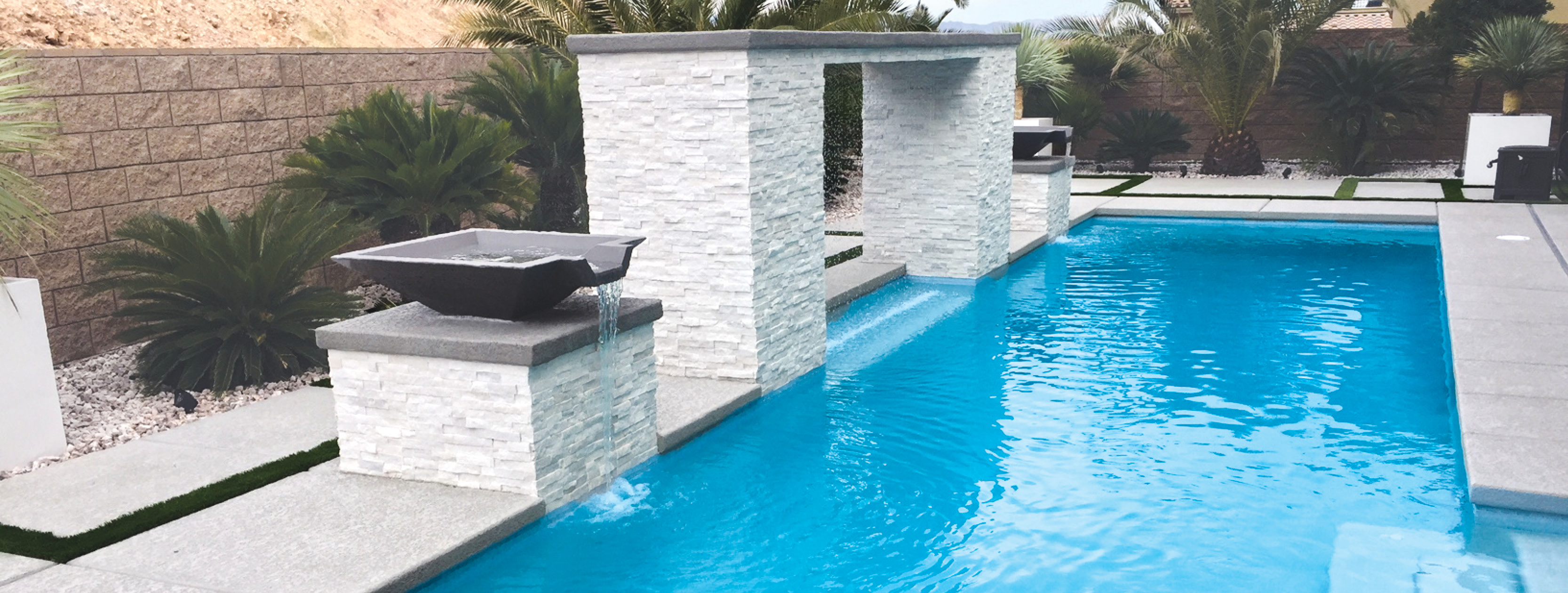 Rain curtain and water bowl on Tucson custom pool.